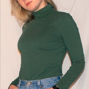 emerald green turtleneck